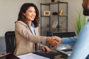 business workers shaking hands